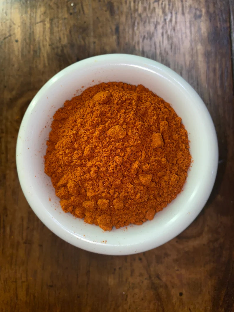 Birds eye chili ground in ramekin